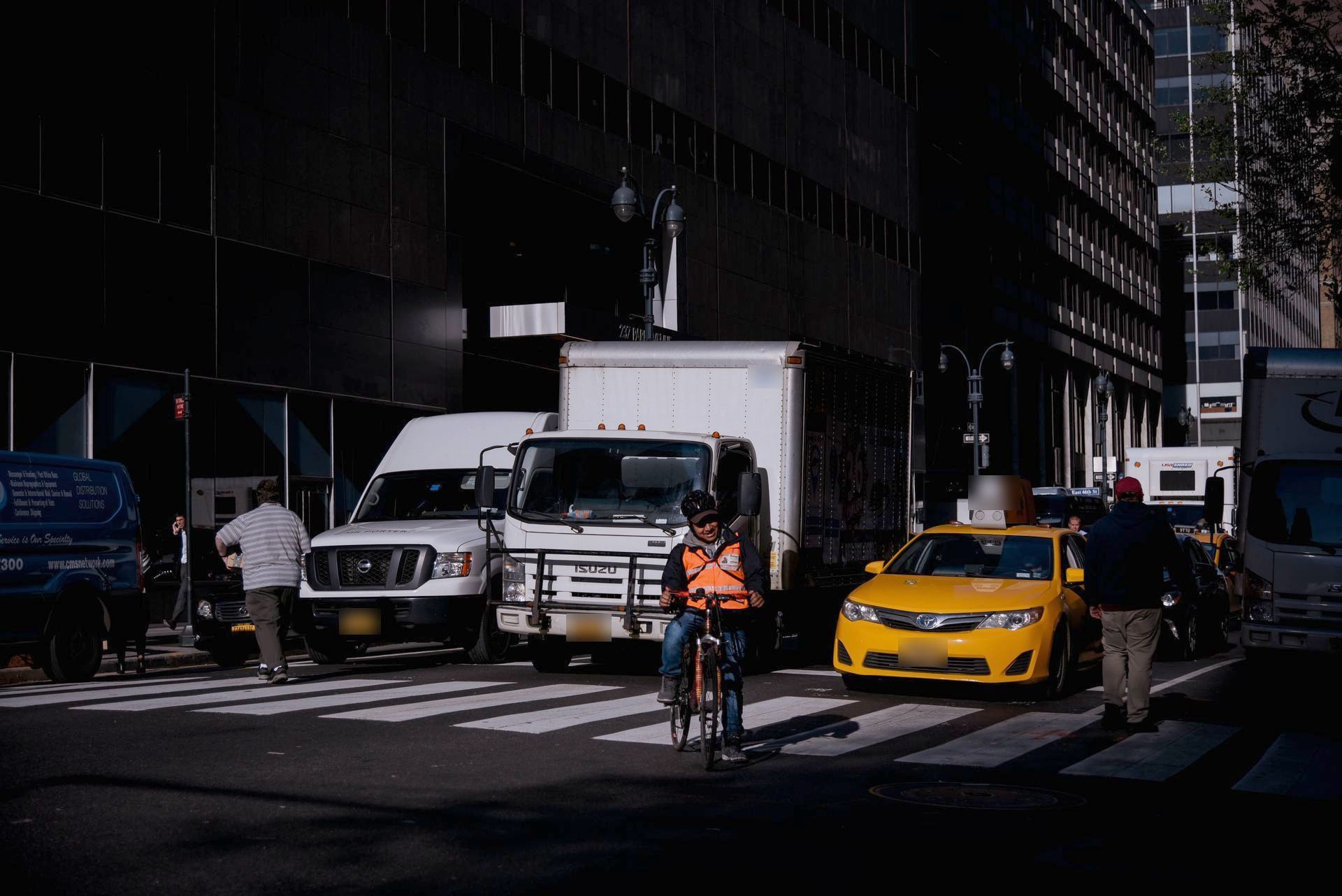 Box truck on a busy city street